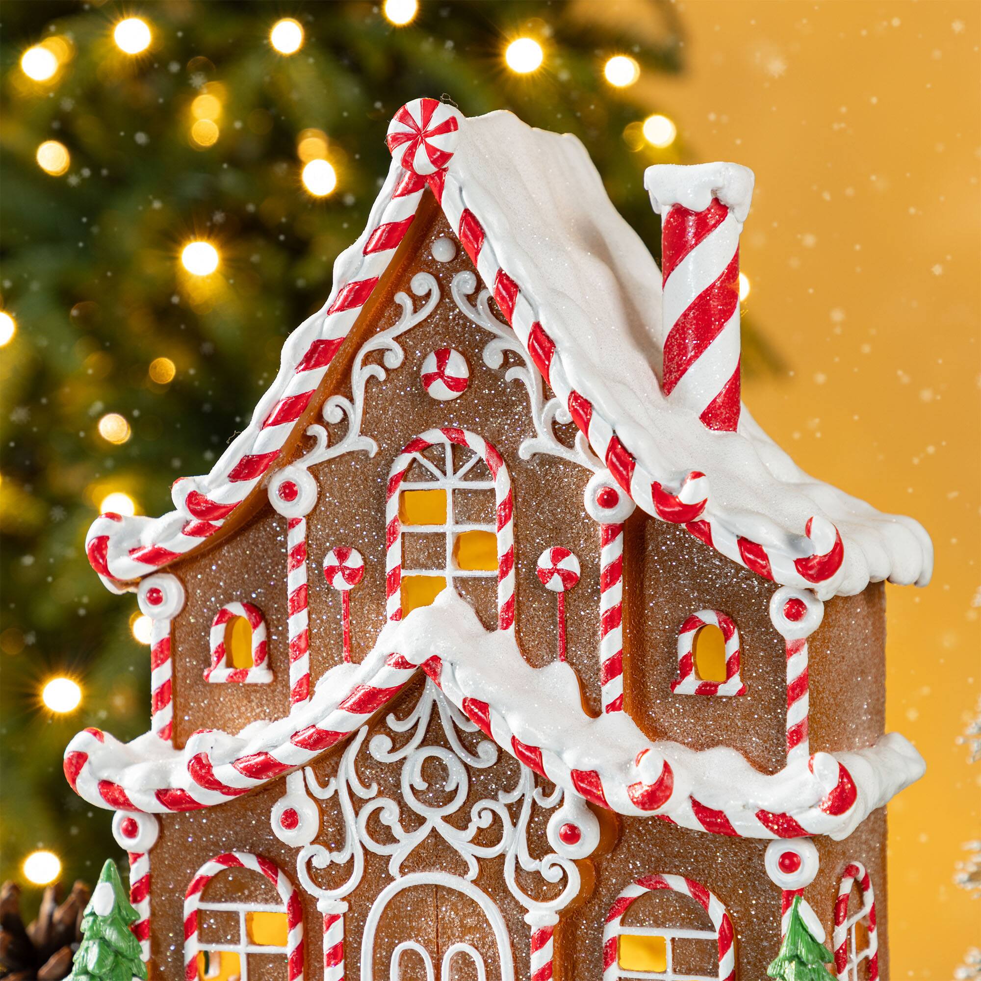 Glitzhome® 11.75" Christmas Lighted Resin Village Table Decor